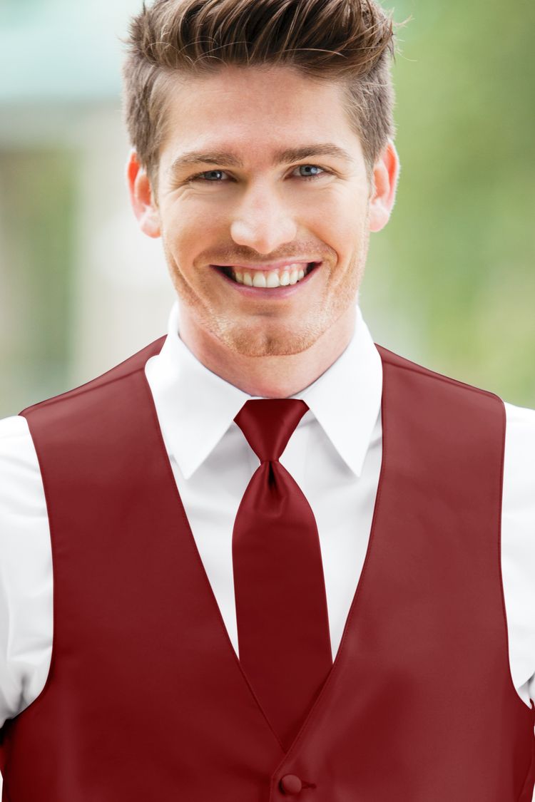 Guy wearing the Expressions Apple Red Windsor Tie with a matching vest