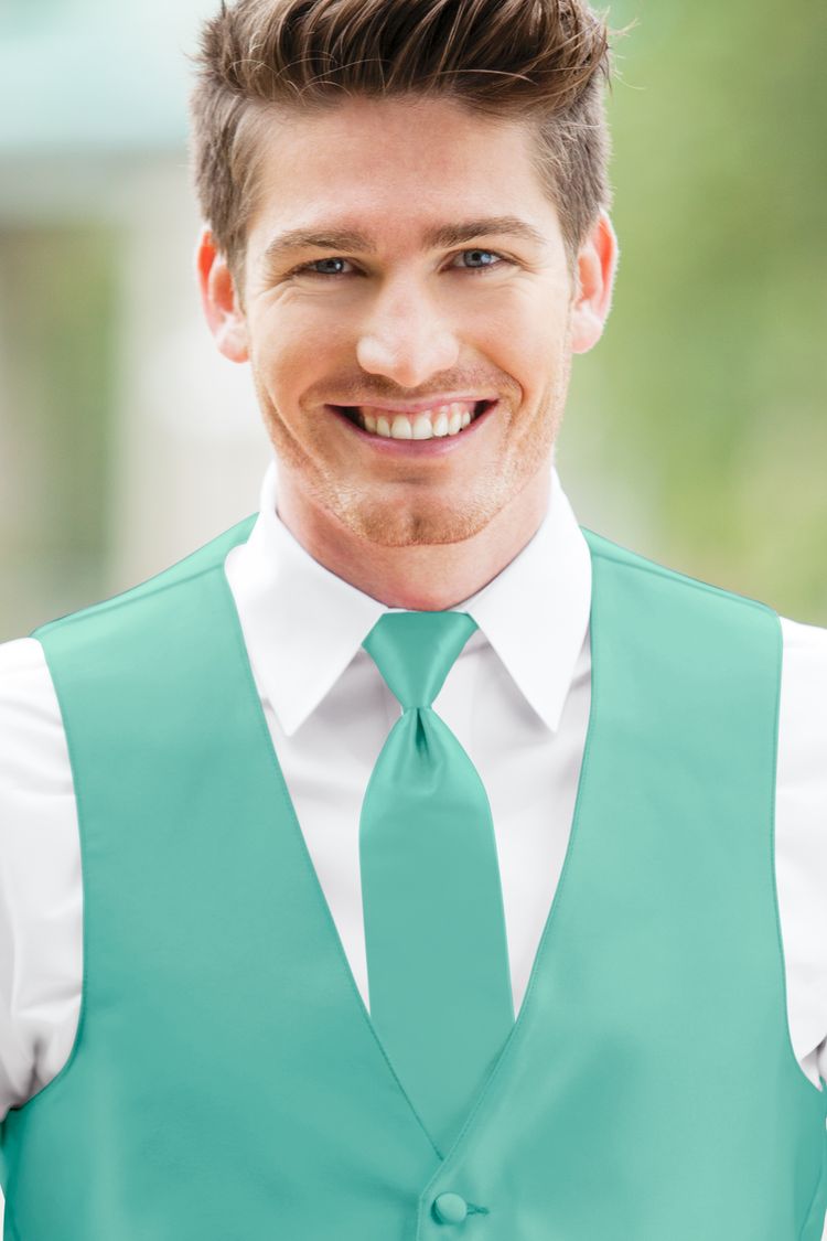 Man wearing the Expressions Aqua Windsor Tie with a matching vest