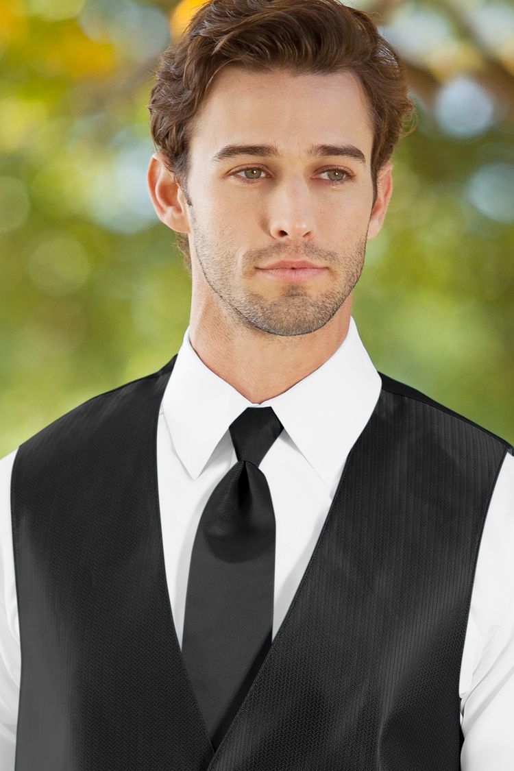 Man wearing the Herringbone Black Windsor Tie with a matching vest