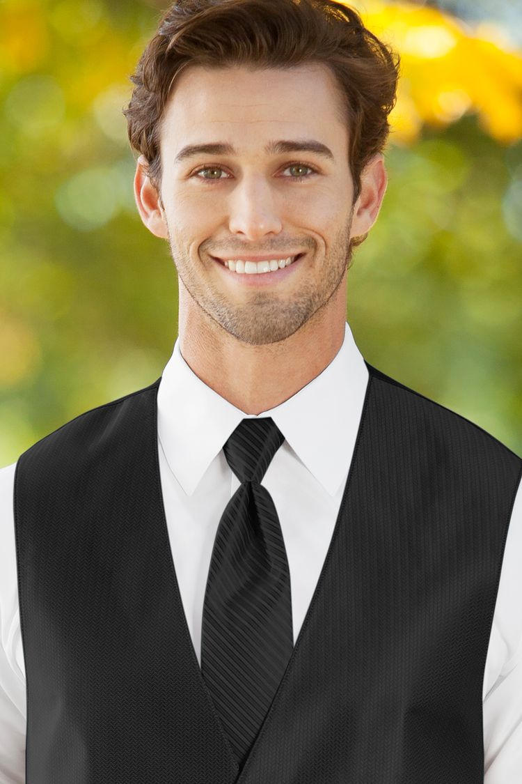 Man wearing the Herringbone Black Windsor Tie with a matching vest
