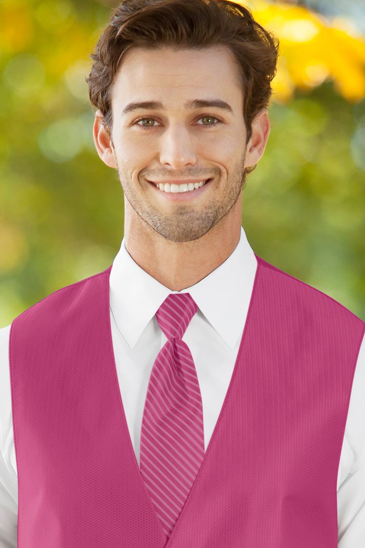 Man wearing the Herringbone Bright Fuchsia Striped Windsor Tie with a matching vest