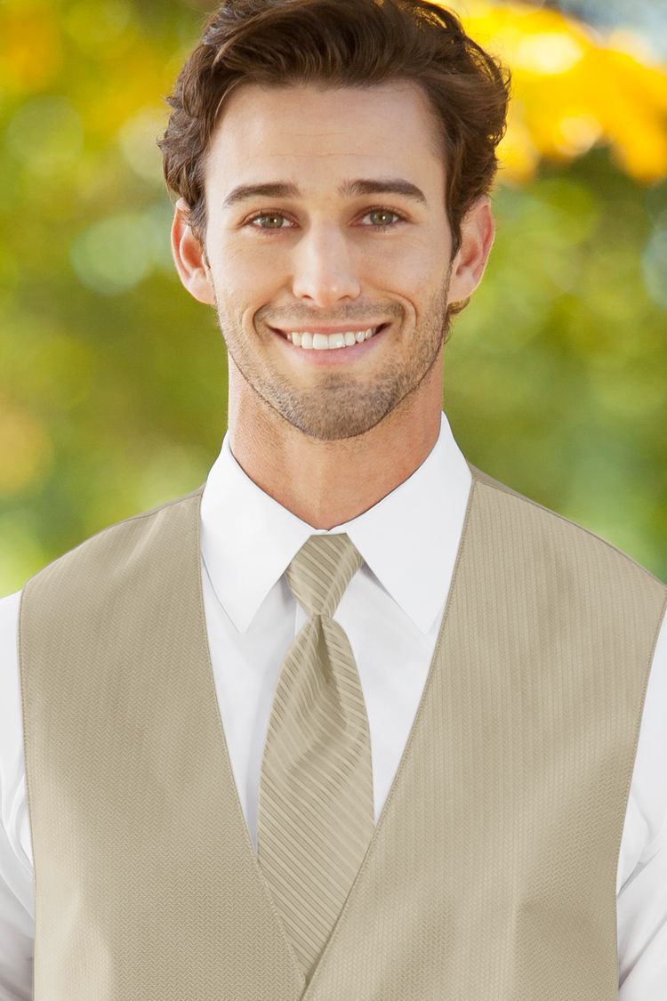 Man wearing the Herringbone Champagne Striped Windsor Tie with a matching vest