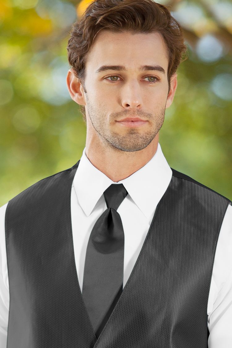 Man wearing the Herringbone Charcoal Windsor Tie with a matching vest