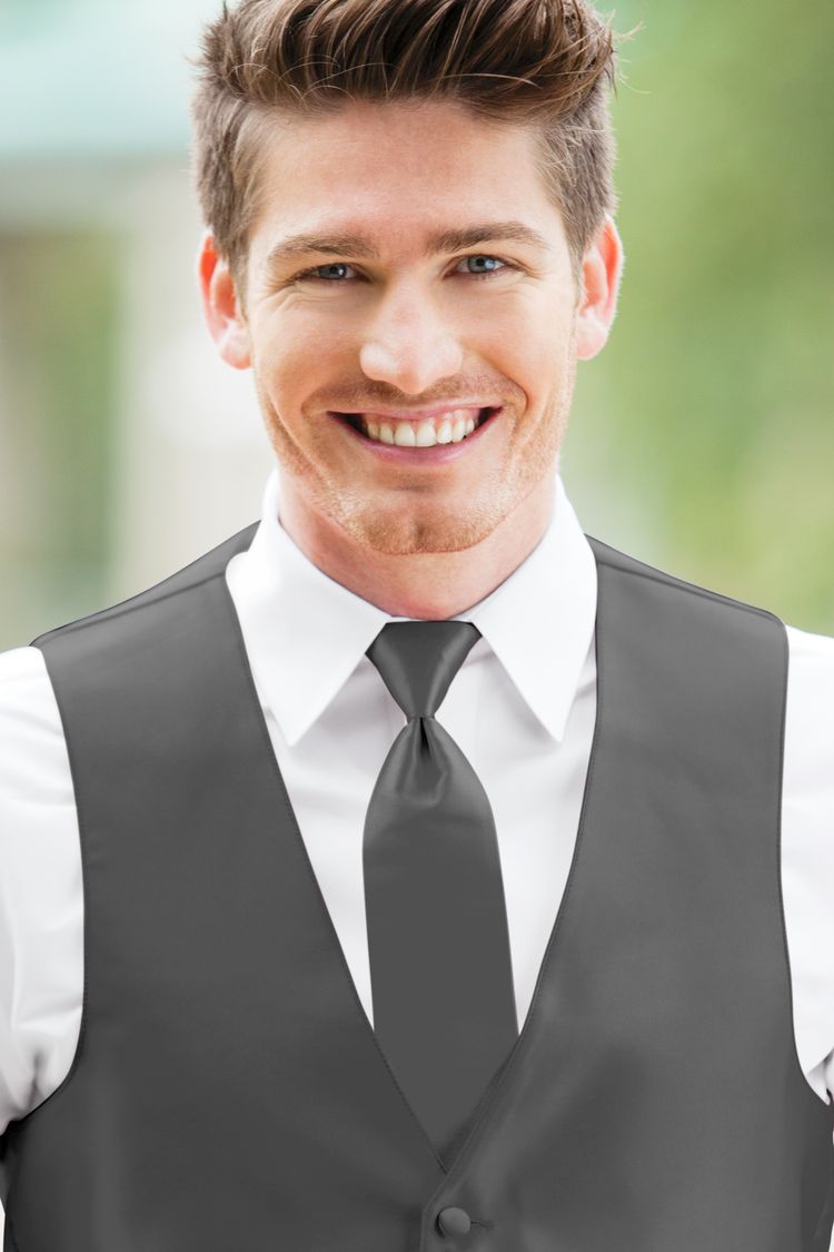 Man wearing the Expressions Charcoal Windsor Tie with a matching vest