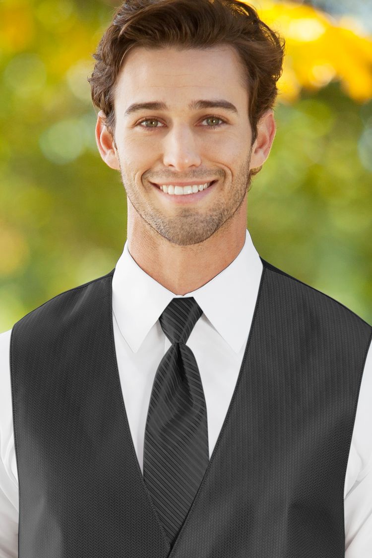 Man wearing the Herringbone Charcoal Striped Windsor Tie with a matching vest