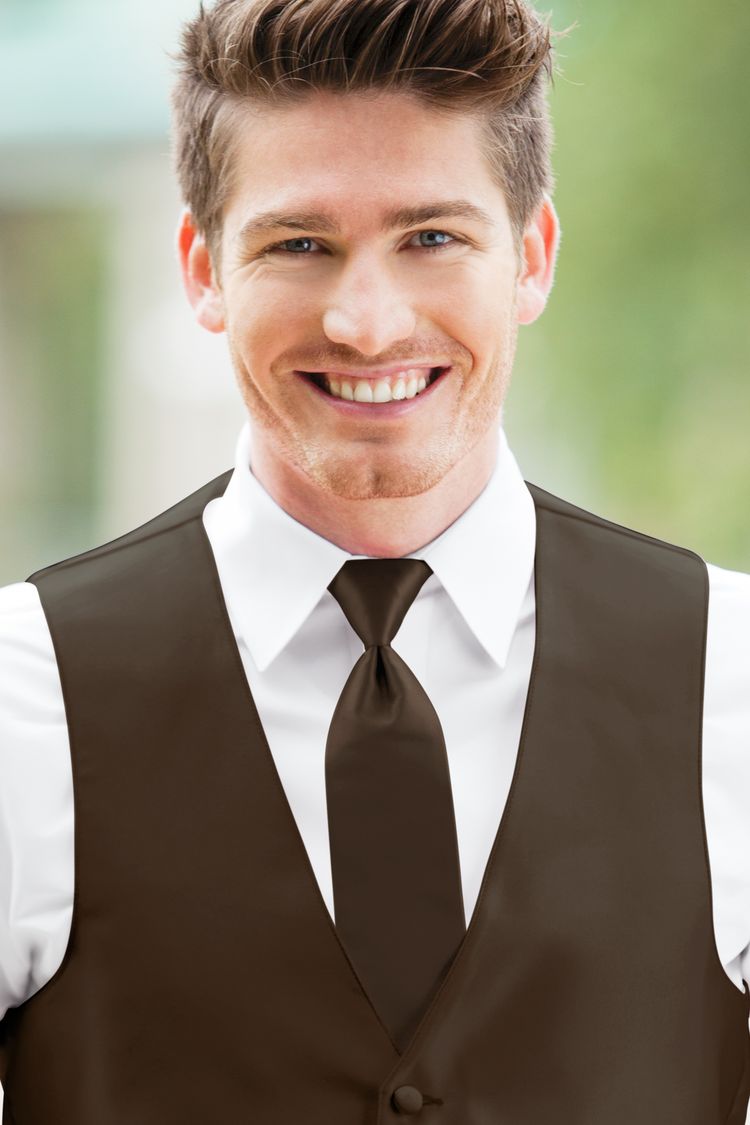 Man wearing the Expressions Chocolate Windsor Tie with a matching vest
