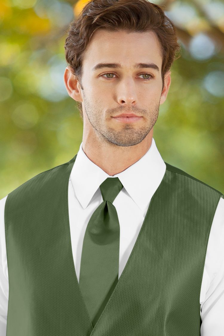 Man wearing the Herringbone Clover Windsor Tie with a matching vest