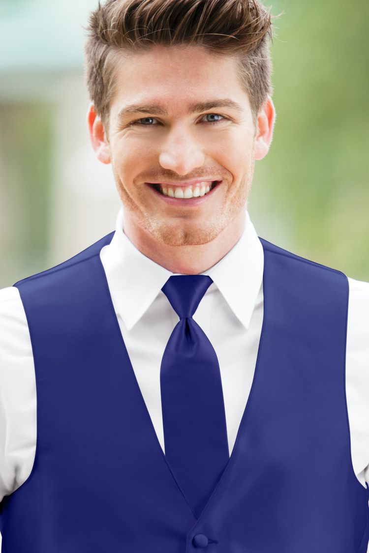 Man wearing the Expressions Cobalt Windsor Tie with a matching vest