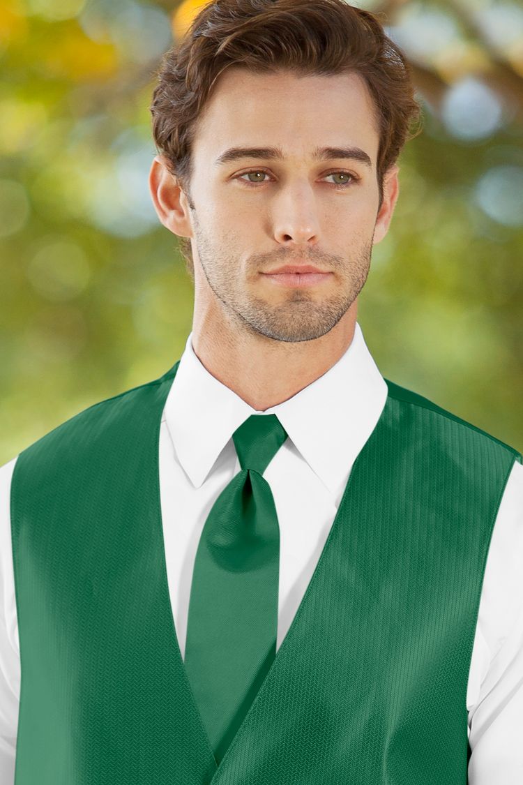 Man wearing the Herringbone Emerald Green Windsor Tie with a matching vest