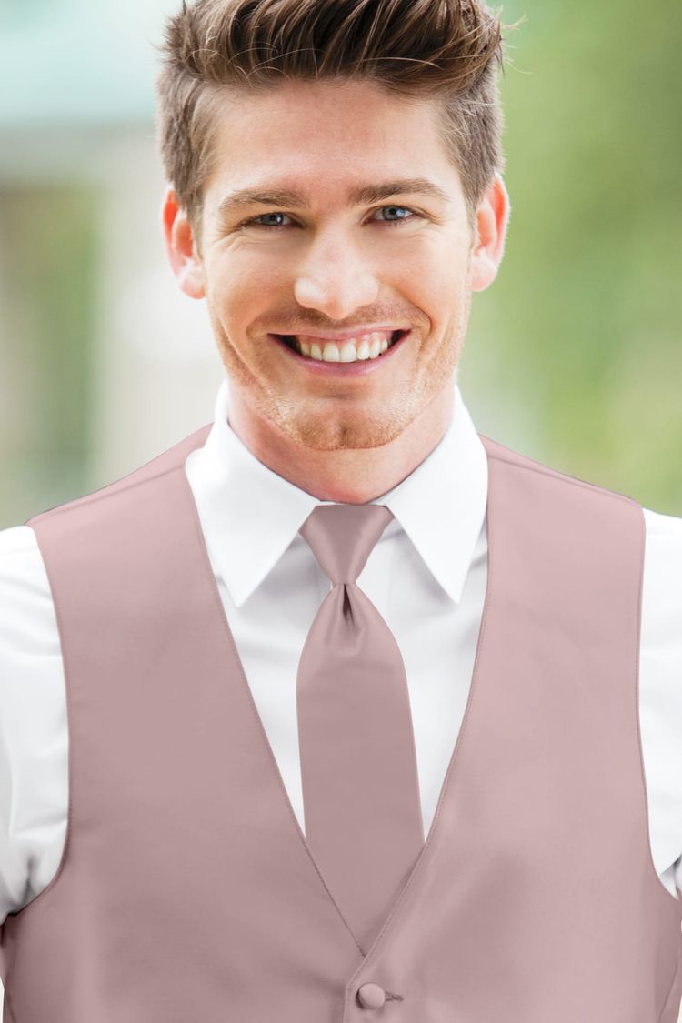 Man wearing a Expressions First Blush Windsor Tie with a matching vest