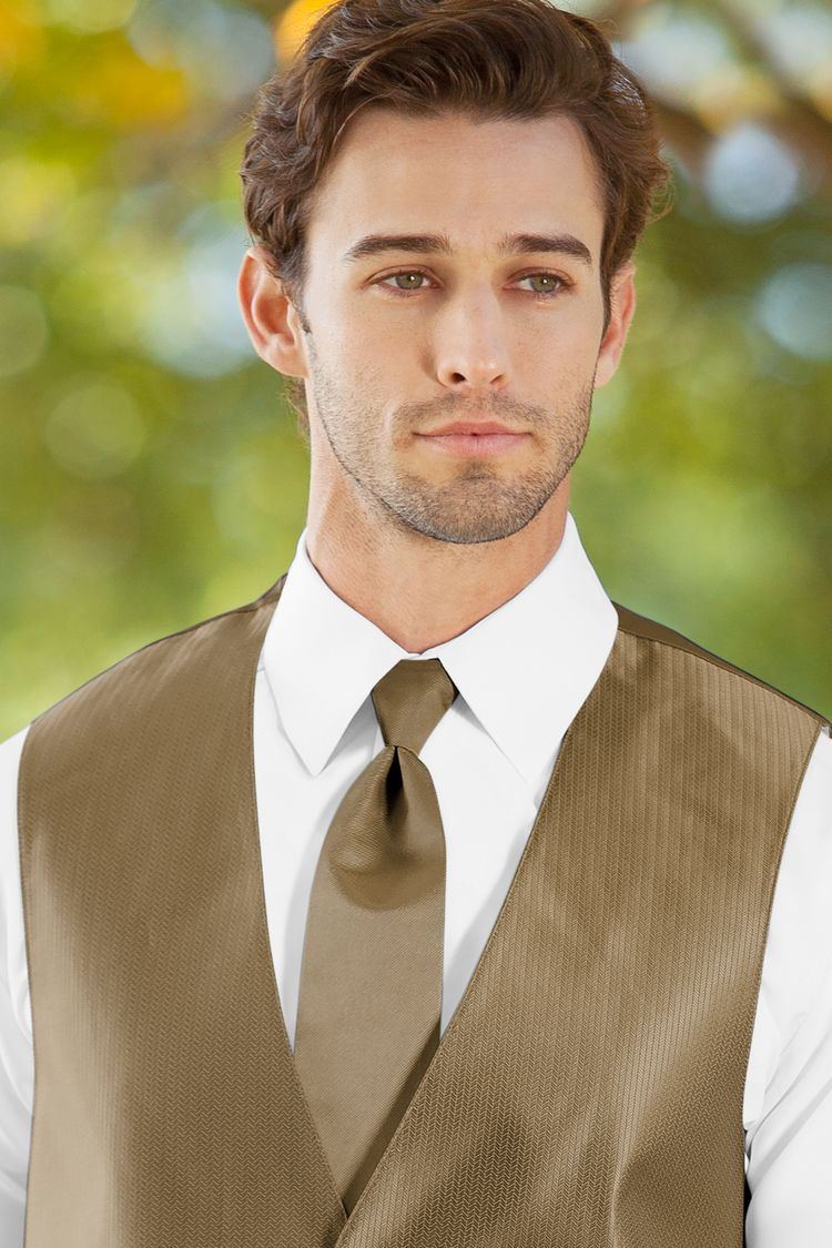 Man wearing the Herringbone Gold Windsor Tie with a matching vest