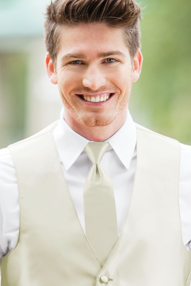 Man wearing the Expressions Ivory Windsor Tie with a matching vest