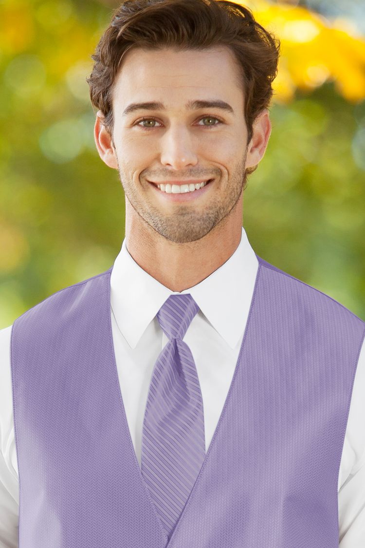 Man wearing the striped Herringbone Lavender Windsor Tie with a matching vest