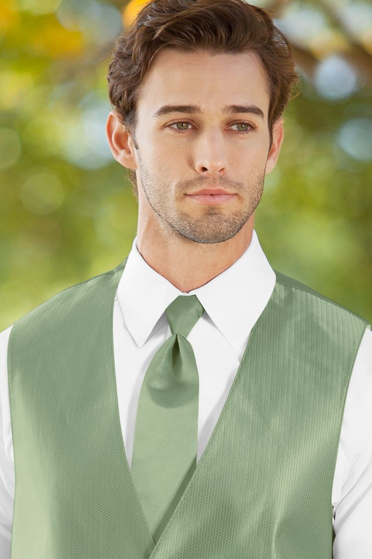 Man wearing the Herringbone Meadow Windsor Tie with a matching vest