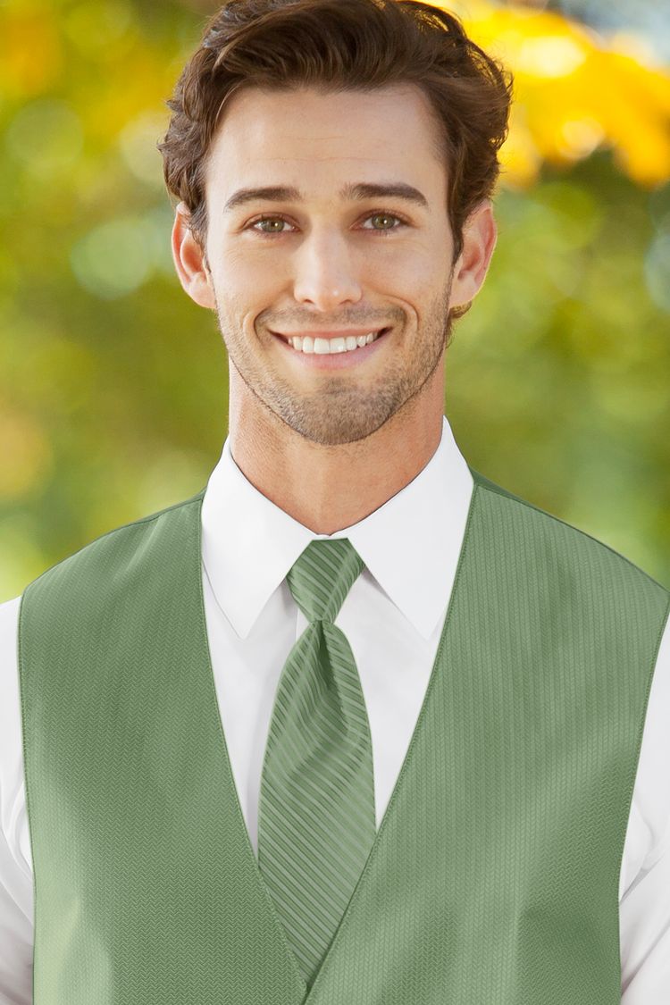 Man wearing the striped Herringbone Meadow Windsor Tie with a matching vest
