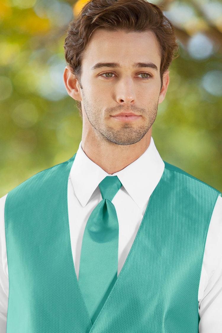 Man wearing the Herringbone Mermaid Windsor Tie with a matching vest