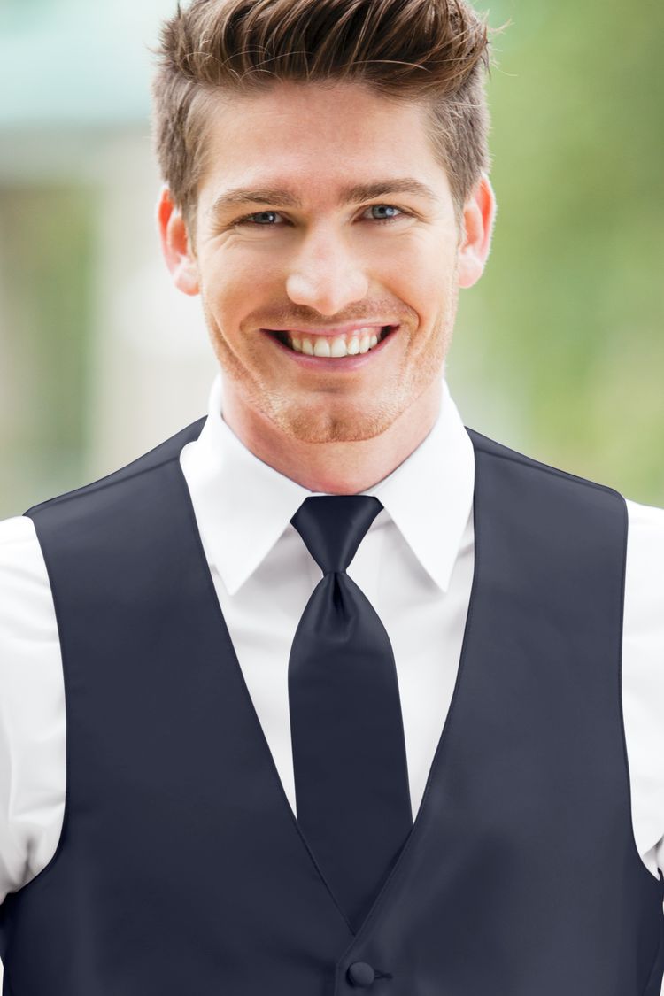 Man wearing the Expressions Navy Windsor Tie with a matching vest