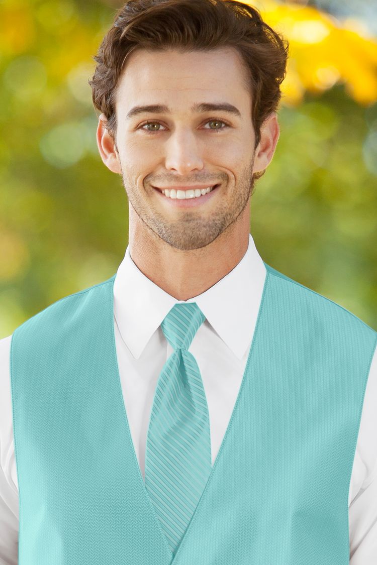 Man wearing the striped Herringbone Pool Windsor Tie with a matching vest