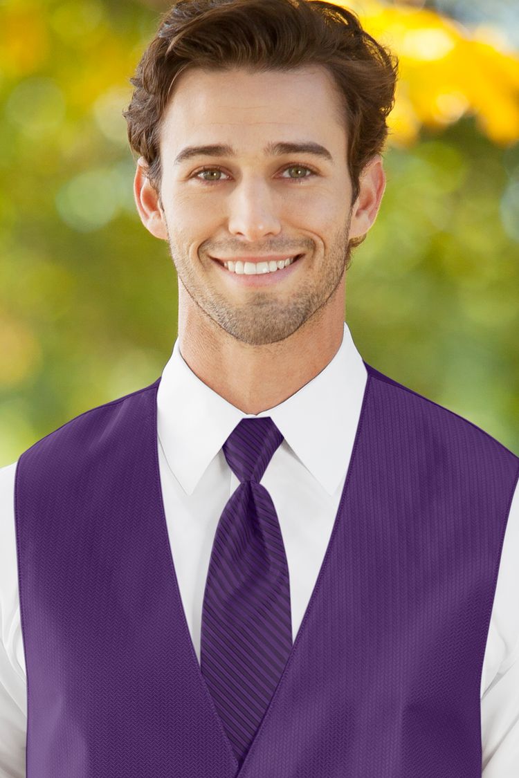 Man wearing the striped Herringbone Purple Windsor Tie with a matching vest