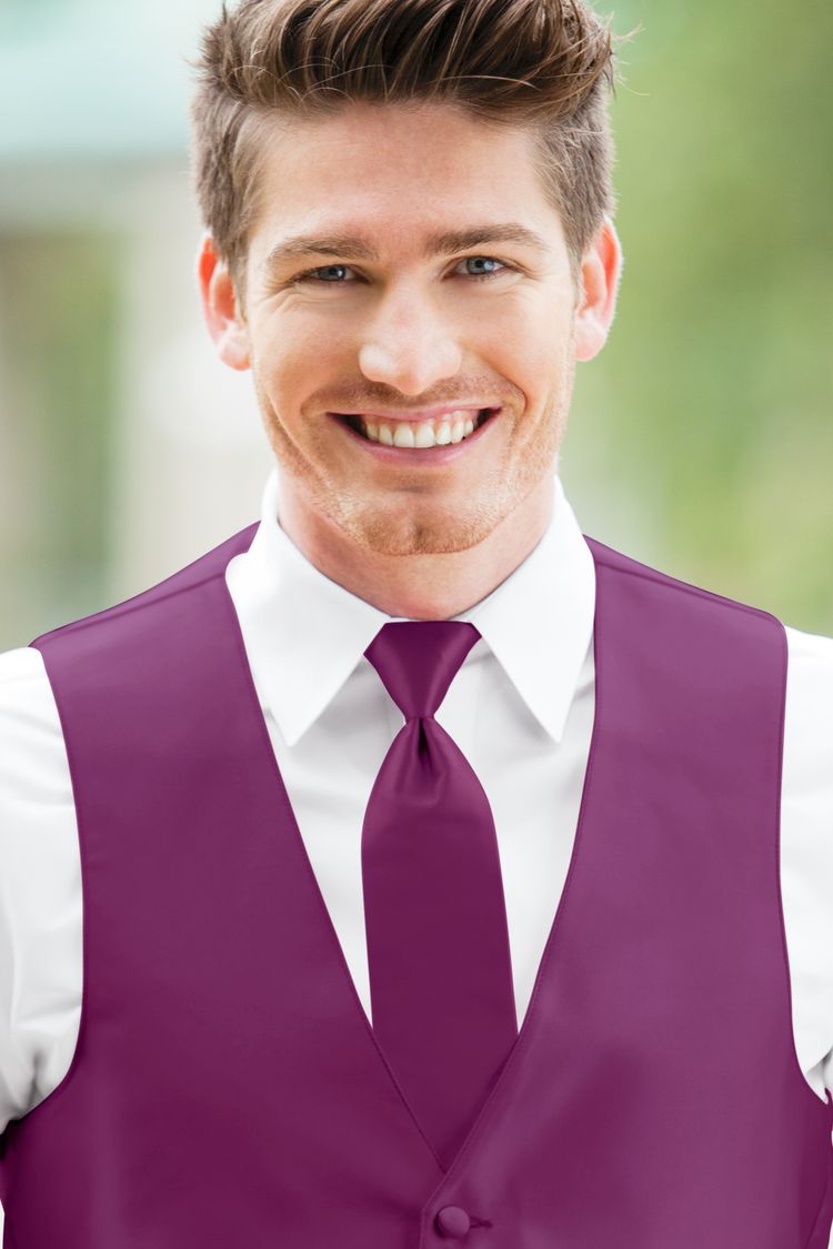 Man wearing the Expressions Raspberry Windsor Tie with a matching vest