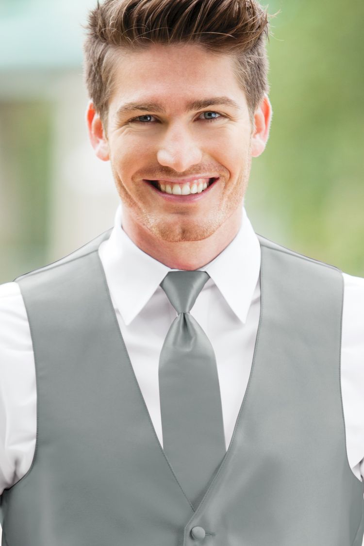 Man wearing the Expressions Silver Windsor Tie with a matching vest
