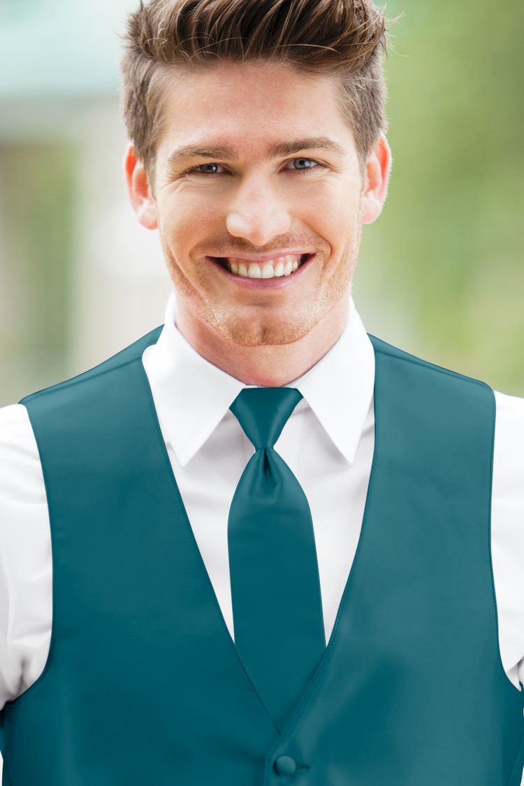 Man wearing the Expressions Teal Windsor Tie with a matching vest