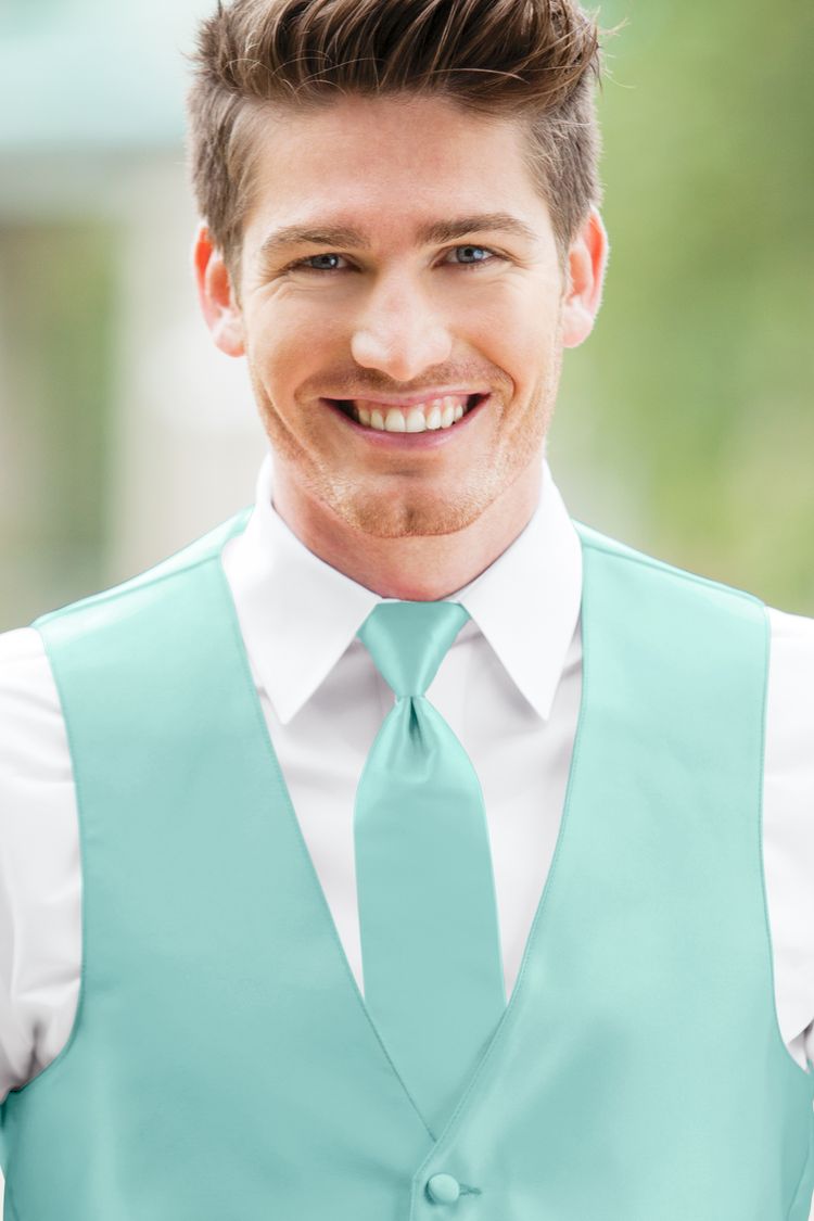 Man wearing the Expressions Tiffany Blue Windsor Tie with a matching vest