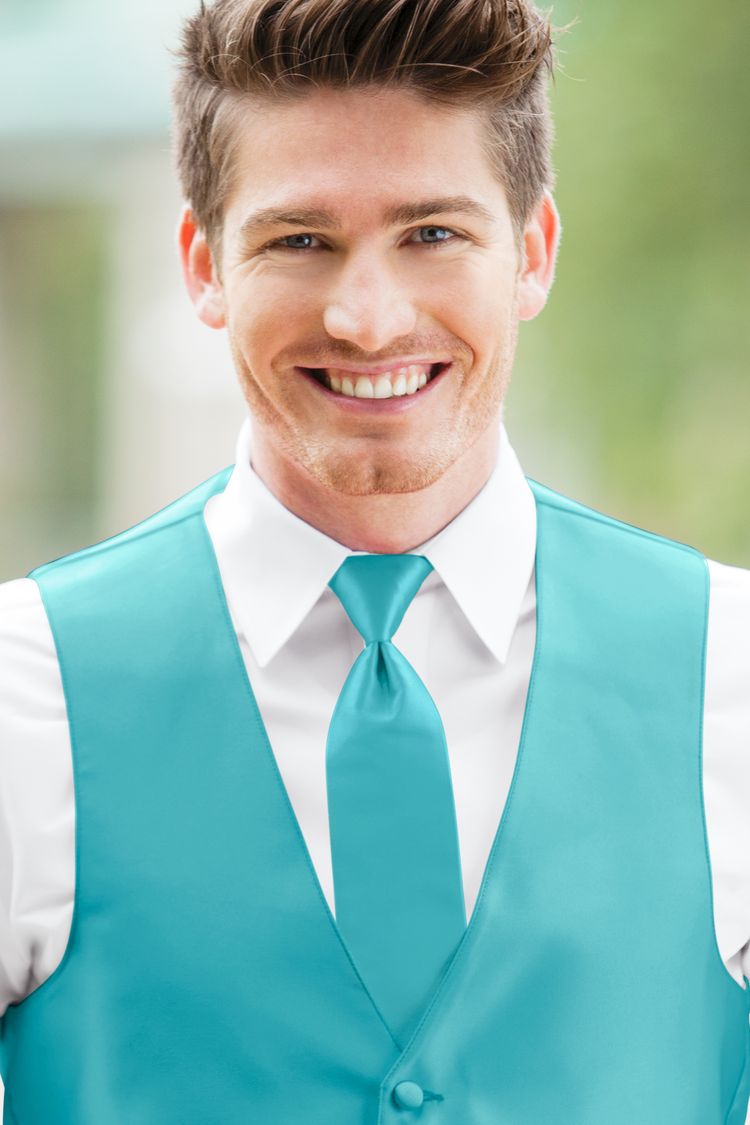 Man wearing the Expressions Turquoise Windsor Tie with a matching vest