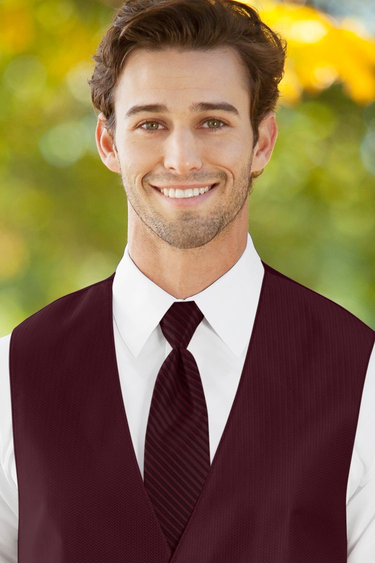 Man wearing the striped Herringbone Wine Windsor Tie with a matching vest